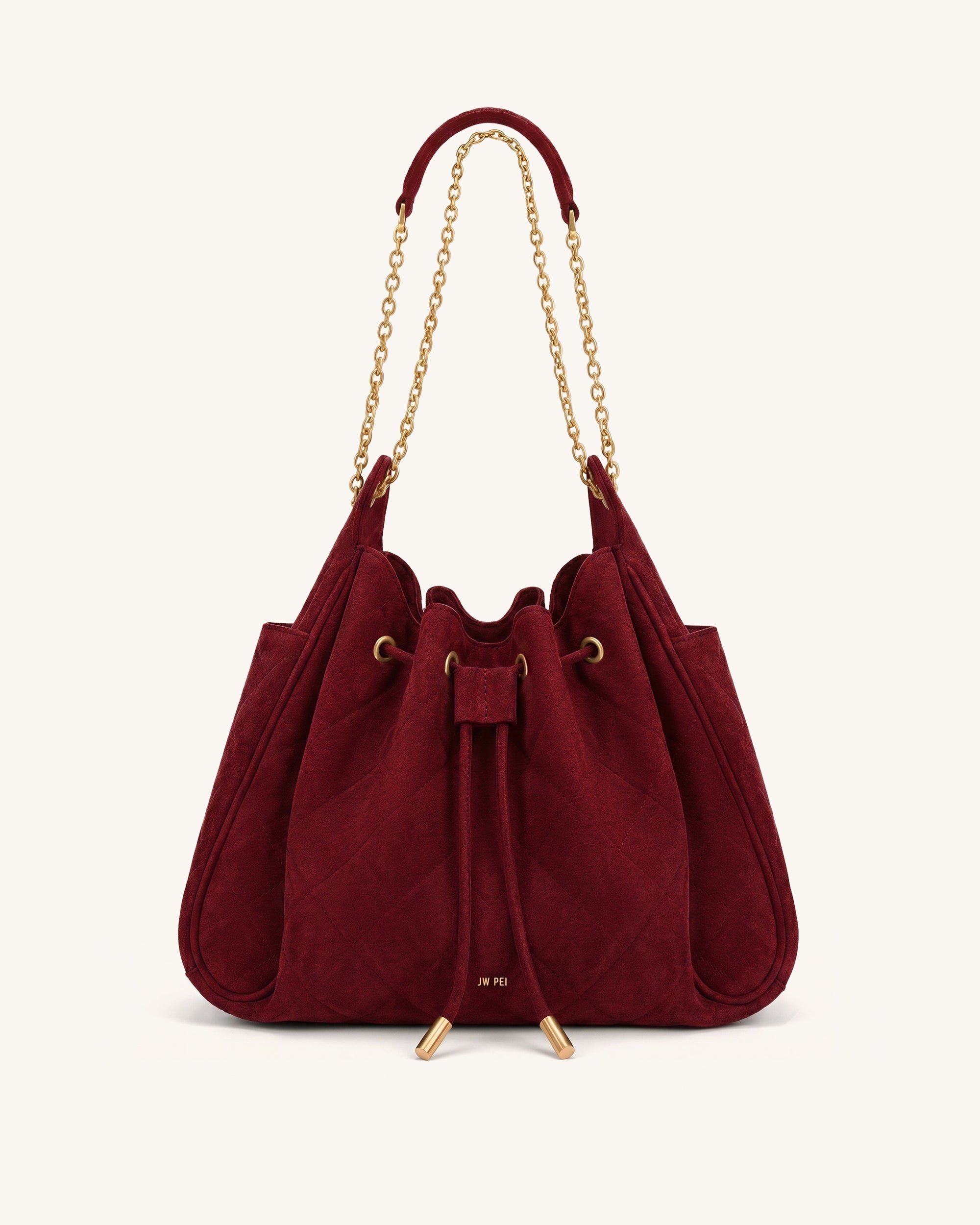Rowan Sac seau matelassé à chaîne en faux suède - Rouge foncé